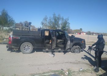 At least 20 dead in gun battles near Texas border