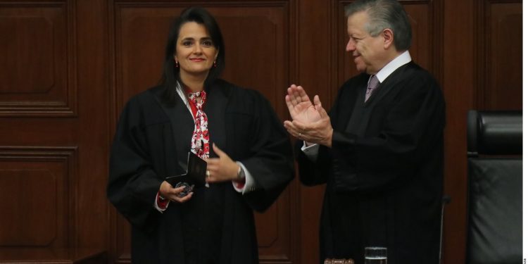 Supreme Court swears in AMLO ally as new justice